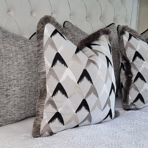 Aspen/ embroidered cushion with contrasting luxury ruche brush fringe