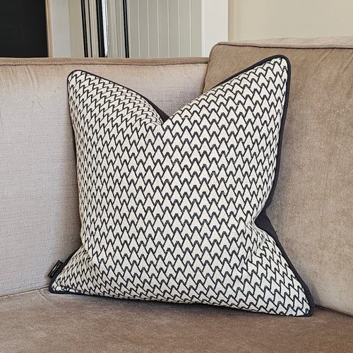 Chevron/ Luxury black/ neutral textured cushion with contrasting piping