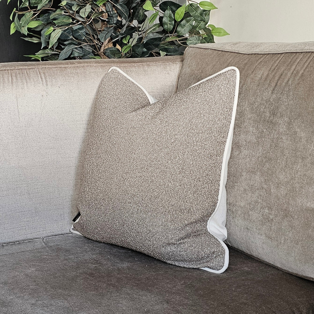 Boucle- taupe / textured boucle cushion / neutral contrasting piping