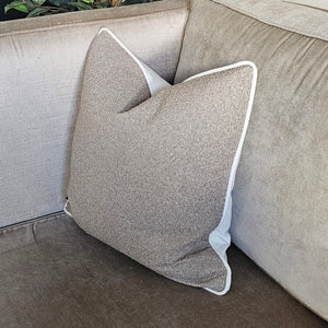 Boucle- taupe / textured boucle cushion / neutral contrasting piping