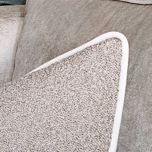 Boucle- taupe / textured boucle cushion / neutral contrasting piping