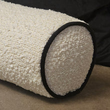 Load image into Gallery viewer, Cream boucle textured bolster cushion with contrasting black piping
