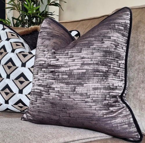Ellena cushion with contrasting black piping