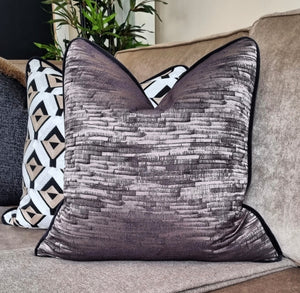 Ellena cushion with contrasting black piping
